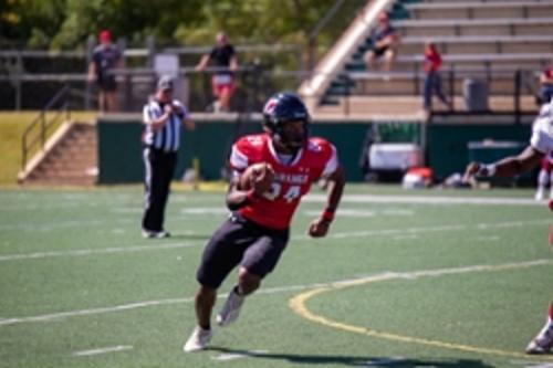 Student playing football